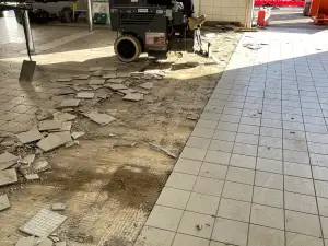 Mercedes Servicing Tile Removal